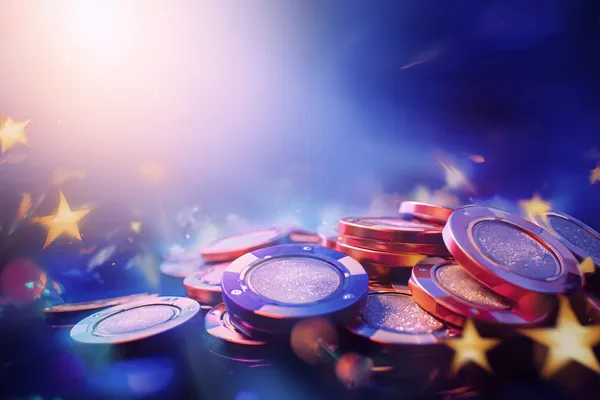 A glamorous woman holding casino chips in a neon-lit environment, representing the premium online casino atmosphere of 7Z778.